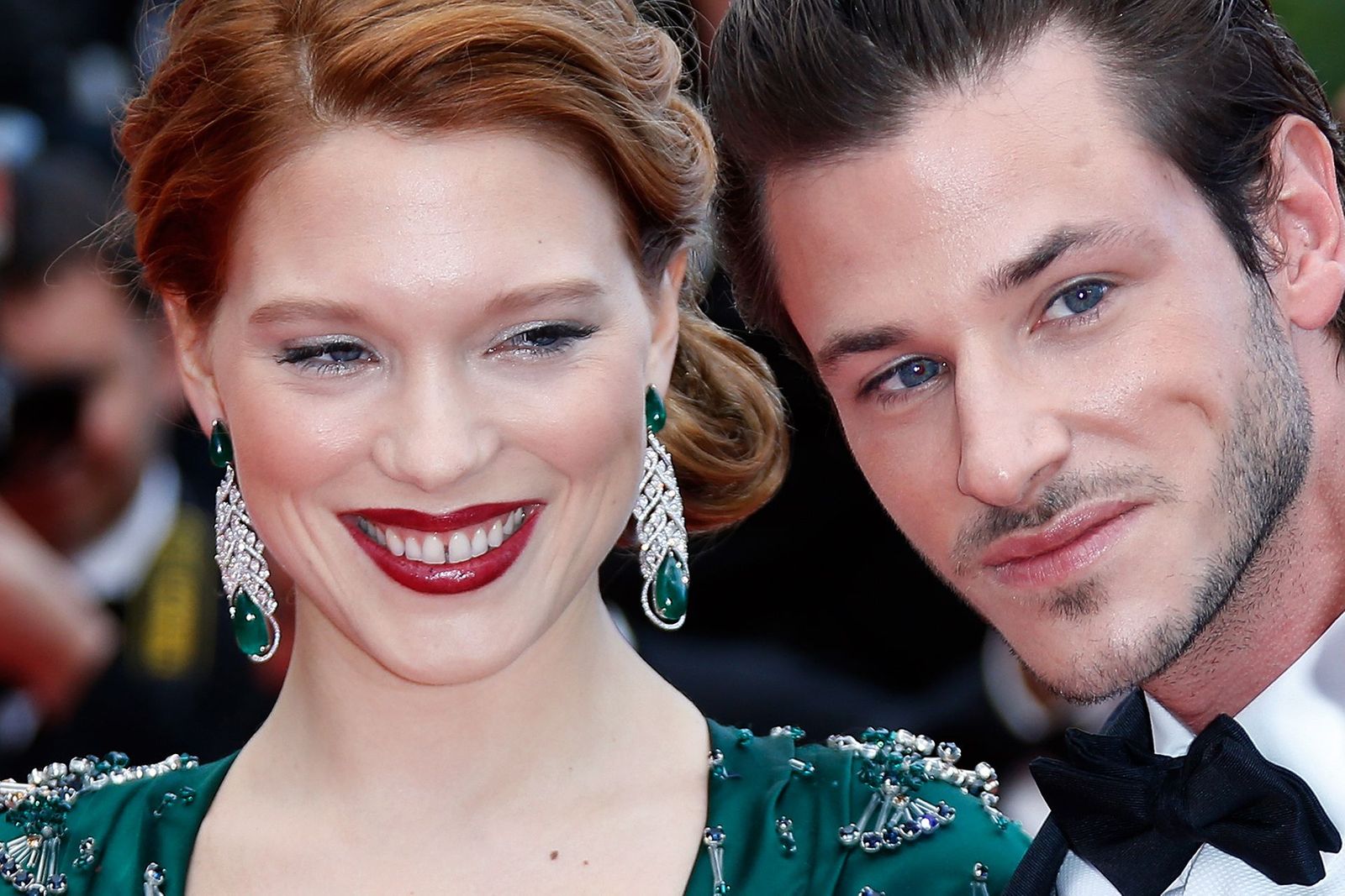 Gaspard Ulliel (L) and Lea Seydoux arrive on the red carpet before