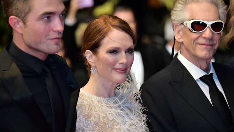 Robert Pattinson, Julianne Moore and David Cronenberg - Red carpet - Maps to the stars © AFP / B. Langlois