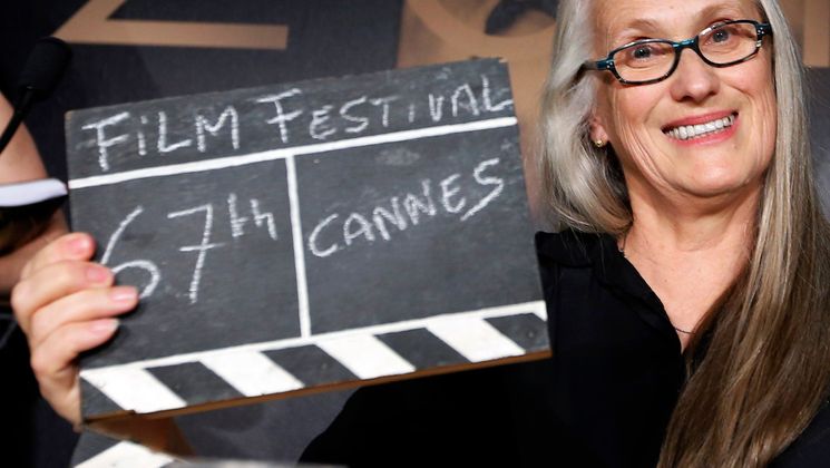 Jane Campion, Jury President, holds a film clapper before the opening ceremony © Eric Gaillard