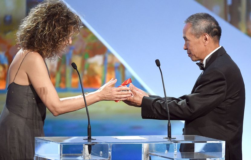 Valeria Golino and Hou Hsiao-Hsien - Best Director - The Assassin © AFP / Anne-Christine Poujoulat