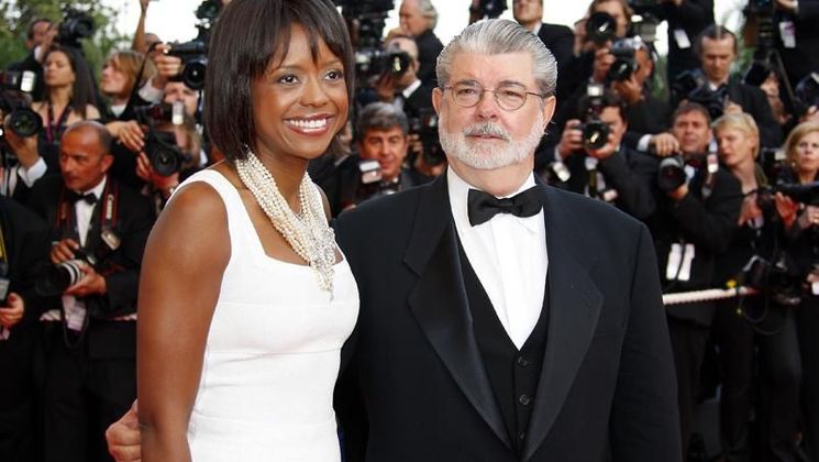 George Lucas, Clinbing of the Steps of the film Kung Fu Panda © AFP