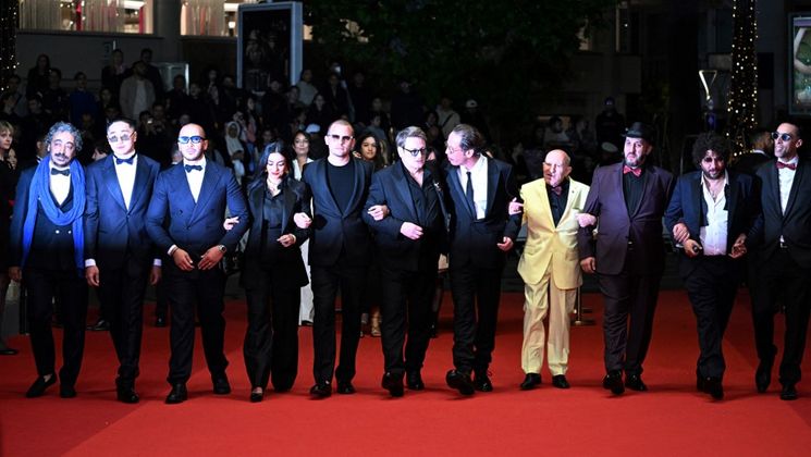OMAR LA FRAISE film cast - Red steps © Patricia DE MELO MOREIRA / AFP