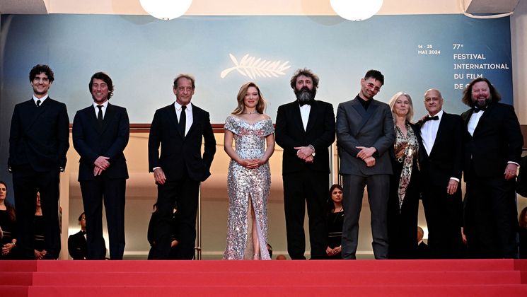 (FromL) French actor Louis Garrel, French producer Hugo Selignac, French actor Vincent Lindon, French actress Lea Seydoux, French director Quentin Dupieux, French actor Raphael Quenard, two guests and French actor Manuel Guillot arrive for the Opening Ceremony and the screening of the film "Le Deuxieme Acte" at the 77th edition of the Cannes Film Festival in Cannes, southern France, on May 14, 2024. (Photo by LOIC VENANCE / AFP)
