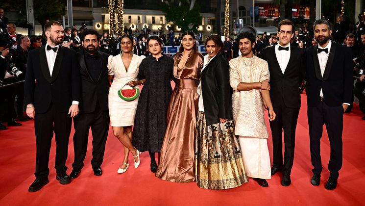 (FromL) French producer Thomas Hakim, Indian co-producer Zico Maitra, Indian actress Kani Kusruti, Indian director Payal Kapadia, Indian actress Divya Prabha, Indian actress Chhaya Kadam, Indian actor Hridhu Haroon, French producer Julien Graff and Indian co-producer Ranabir Das arrive for the screening of the film "All We Imagine as Light" at the 77th edition of the Cannes Film Festival in Cannes, southern France, on May 23, 2024. (Photo by LOIC VENANCE / AFP) © LOIC VENANCE / AFP