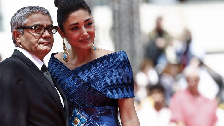 Mohammad Rasoulof & Golshifteh Farahani - THE SEED OF THE SACRED FIG Red steps © Sameer Al-Doumy / AFP