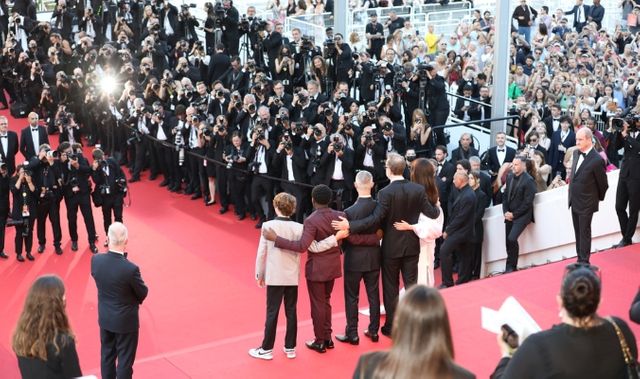 Film team at the top of the Red Carpet © Maxence Parey  / FDC